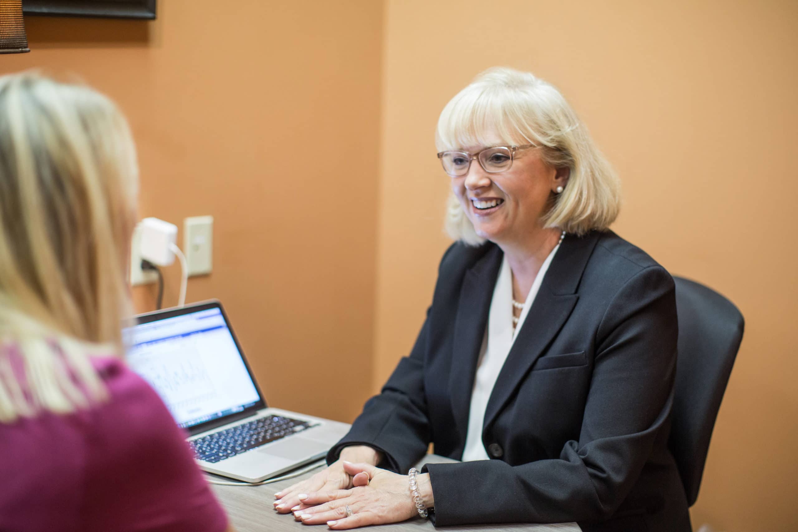 realtor at desk